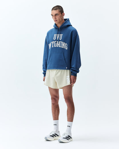Off white split shorts with black elastic waistband